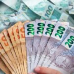 Dois pagamentos serão liberados nesta quarta (15): veja quem pode receber R$ 1.621 do Abono Salarial e até R$ 1.000 do lote especial do IR